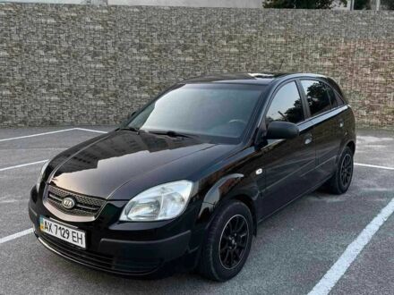 Чорний Кіа Ріо, об'ємом двигуна 1.4 л та пробігом 220 тис. км за 3860 $, фото 1 на Automoto.ua