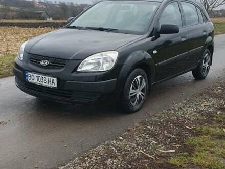 Чорний Кіа Ріо, об'ємом двигуна 1.4 л та пробігом 220 тис. км за 4499 $, фото 1 на Automoto.ua