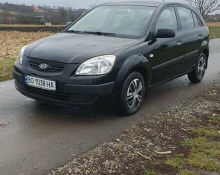 Чорний Кіа Ріо, об'ємом двигуна 1.4 л та пробігом 220 тис. км за 4499 $, фото 1 на Automoto.ua