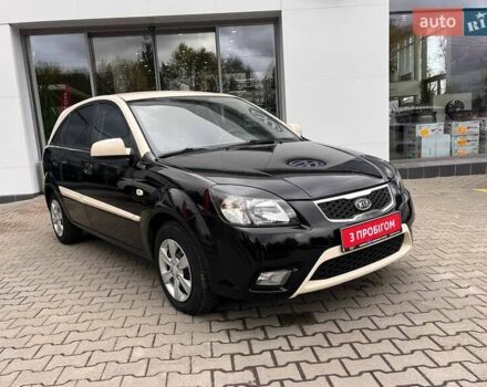 Чорний Кіа Ріо, об'ємом двигуна 1.5 л та пробігом 265 тис. км за 4700 $, фото 1 на Automoto.ua