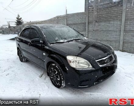 Черный Киа Рио, объемом двигателя 1.4 л и пробегом 167 тыс. км за 5550 $, фото 1 на Automoto.ua