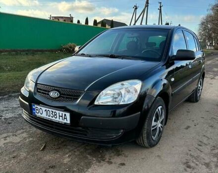 Черный Киа Рио, объемом двигателя 1.4 л и пробегом 220 тыс. км за 4399 $, фото 1 на Automoto.ua