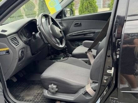 Чорний Кіа Ріо, об'ємом двигуна 1.4 л та пробігом 202 тис. км за 5000 $, фото 1 на Automoto.ua