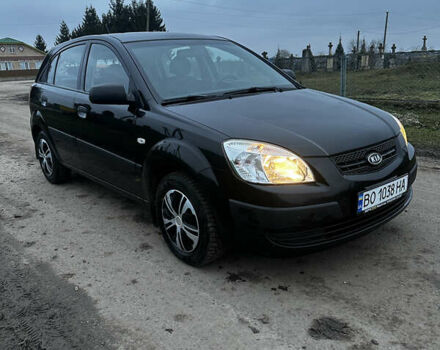 Черный Киа Рио, объемом двигателя 1.4 л и пробегом 220 тыс. км за 4499 $, фото 1 на Automoto.ua