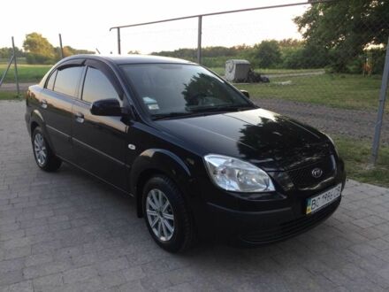 Черный Киа Рио, объемом двигателя 1.6 л и пробегом 360 тыс. км за 3900 $, фото 1 на Automoto.ua