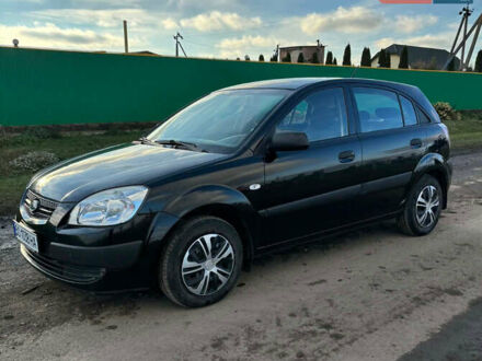 Чорний Кіа Ріо, об'ємом двигуна 1.4 л та пробігом 220 тис. км за 4399 $, фото 1 на Automoto.ua