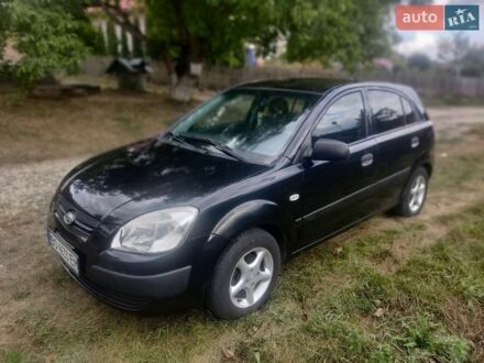 Черный Киа Рио, объемом двигателя 1.4 л и пробегом 260 тыс. км за 3450 $, фото 1 на Automoto.ua