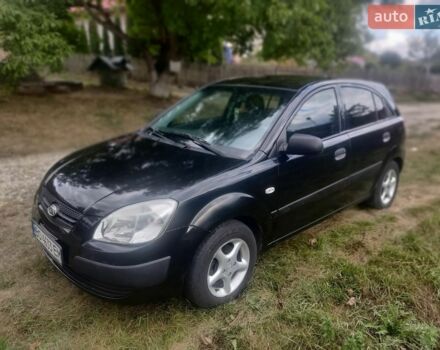 Черный Киа Рио, объемом двигателя 1.4 л и пробегом 260 тыс. км за 3450 $, фото 1 на Automoto.ua