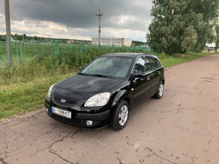 Чорний Кіа Ріо, об'ємом двигуна 1.4 л та пробігом 98 тис. км за 6200 $, фото 1 на Automoto.ua