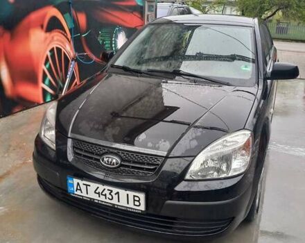 Черный Киа Рио, объемом двигателя 1.4 л и пробегом 230 тыс. км за 5305 $, фото 1 на Automoto.ua