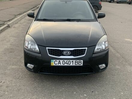 Чорний Кіа Ріо, об'ємом двигуна 1.4 л та пробігом 189 тис. км за 5463 $, фото 1 на Automoto.ua