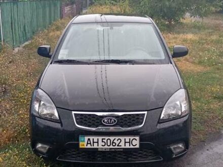 Черный Киа Рио, объемом двигателя 1.4 л и пробегом 32 тыс. км за 6800 $, фото 1 на Automoto.ua