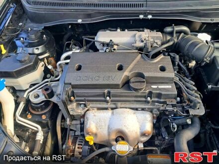 Черный Киа Рио, объемом двигателя 1.4 л и пробегом 107 тыс. км за 5000 $, фото 1 на Automoto.ua