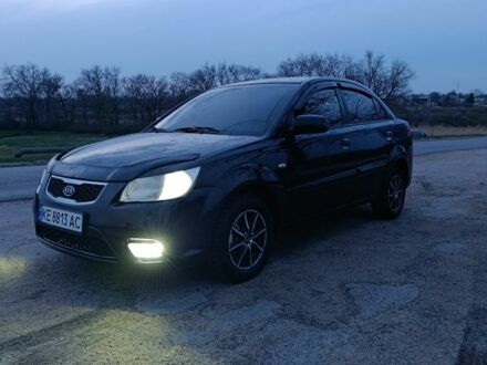 Черный Киа Рио, объемом двигателя 1.4 л и пробегом 280 тыс. км за 5300 $, фото 1 на Automoto.ua