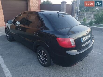 Черный Киа Рио, объемом двигателя 1.4 л и пробегом 210 тыс. км за 4600 $, фото 1 на Automoto.ua