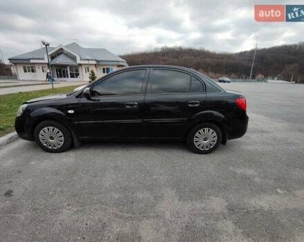 Чорний Кіа Ріо, об'ємом двигуна 1.4 л та пробігом 253 тис. км за 4000 $, фото 1 на Automoto.ua