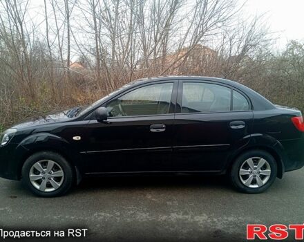 Черный Киа Рио, объемом двигателя 1.4 л и пробегом 186 тыс. км за 4800 $, фото 1 на Automoto.ua