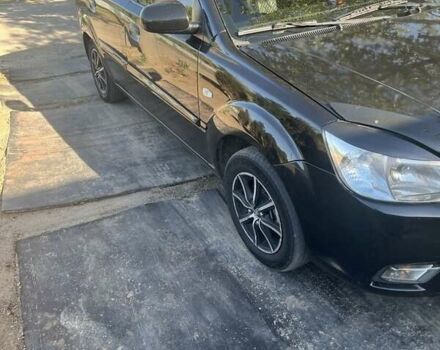 Черный Киа Рио, объемом двигателя 1.4 л и пробегом 282 тыс. км за 4700 $, фото 1 на Automoto.ua
