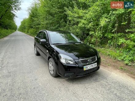 Чорний Кіа Ріо, об'ємом двигуна 1.4 л та пробігом 91 тис. км за 4500 $, фото 1 на Automoto.ua