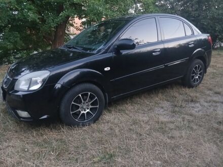 Черный Киа Рио, объемом двигателя 1.4 л и пробегом 210 тыс. км за 4308 $, фото 1 на Automoto.ua