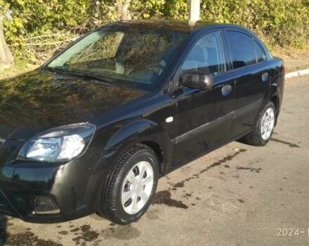 Чорний Кіа Ріо, об'ємом двигуна 1.4 л та пробігом 243 тис. км за 4900 $, фото 1 на Automoto.ua