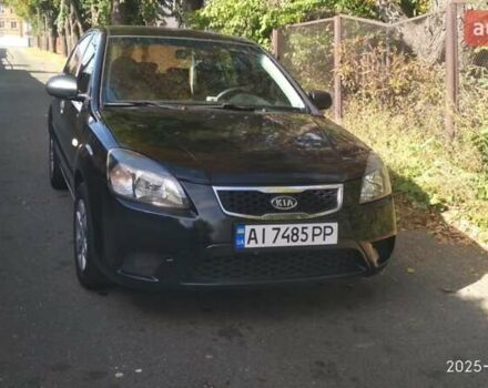 Чорний Кіа Ріо, об'ємом двигуна 1.4 л та пробігом 248 тис. км за 4650 $, фото 1 на Automoto.ua