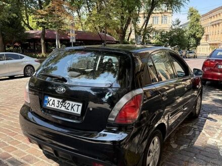 Чорний Кіа Ріо, об'ємом двигуна 1.4 л та пробігом 245 тис. км за 5800 $, фото 1 на Automoto.ua