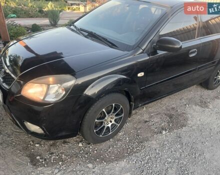 Черный Киа Рио, объемом двигателя 1.4 л и пробегом 210 тыс. км за 4700 $, фото 1 на Automoto.ua