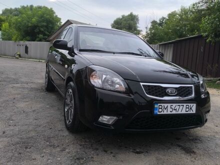 Чорний Кіа Ріо, об'ємом двигуна 1.4 л та пробігом 137 тис. км за 6300 $, фото 1 на Automoto.ua