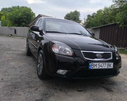 Чорний Кіа Ріо, об'ємом двигуна 1.4 л та пробігом 137 тис. км за 6300 $, фото 1 на Automoto.ua
