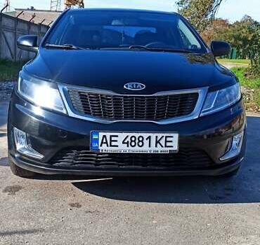 Чорний Кіа Ріо, об'ємом двигуна 1.4 л та пробігом 160 тис. км за 7700 $, фото 1 на Automoto.ua