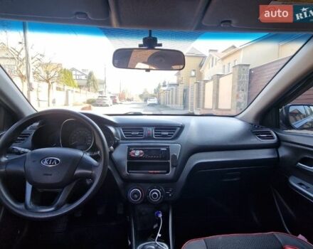 Чорний Кіа Ріо, об'ємом двигуна 1.4 л та пробігом 180 тис. км за 6450 $, фото 1 на Automoto.ua
