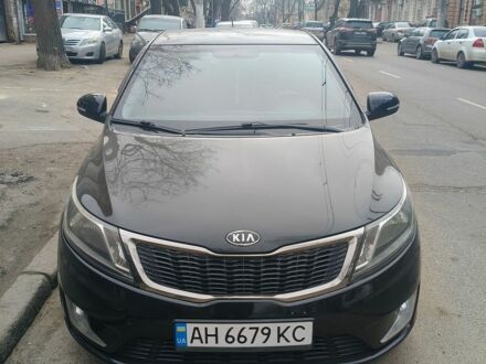 Чорний Кіа Ріо, об'ємом двигуна 1.3 л та пробігом 120 тис. км за 6850 $, фото 1 на Automoto.ua