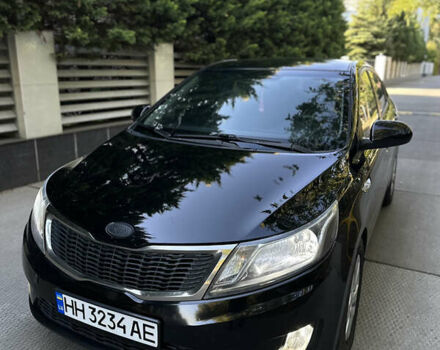 Черный Киа Рио, объемом двигателя 1.4 л и пробегом 183 тыс. км за 6000 $, фото 1 на Automoto.ua