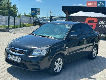 Чорний Кіа Ріо, об'ємом двигуна 1.4 л та пробігом 50 тис. км за 4899 $, фото 1 на Automoto.ua