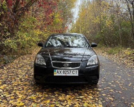 Черный Киа Рио, объемом двигателя 1.4 л и пробегом 207 тыс. км за 6400 $, фото 1 на Automoto.ua
