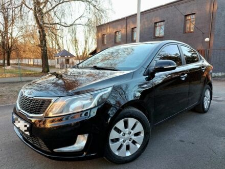 Чорний Кіа Ріо, об'ємом двигуна 1.6 л та пробігом 231 тис. км за 7800 $, фото 1 на Automoto.ua