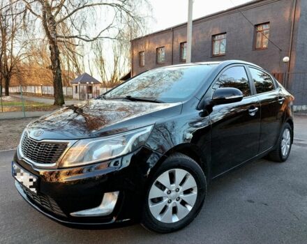 Черный Киа Рио, объемом двигателя 1.6 л и пробегом 231 тыс. км за 7800 $, фото 1 на Automoto.ua