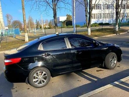 Чорний Кіа Ріо, об'ємом двигуна 1.4 л та пробігом 1 тис. км за 7100 $, фото 1 на Automoto.ua