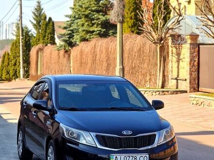 Черный Киа Рио, объемом двигателя 1.4 л и пробегом 180 тыс. км за 6500 $, фото 1 на Automoto.ua