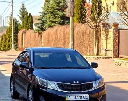 Чорний Кіа Ріо, об'ємом двигуна 1.4 л та пробігом 180 тис. км за 6500 $, фото 1 на Automoto.ua