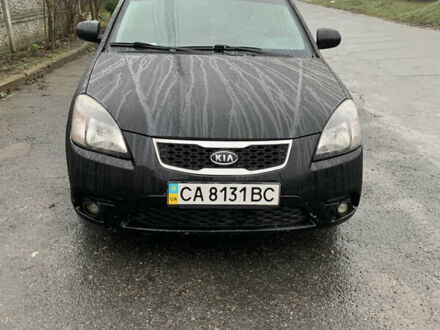 Черный Киа Рио, объемом двигателя 1.4 л и пробегом 105 тыс. км за 4100 $, фото 1 на Automoto.ua