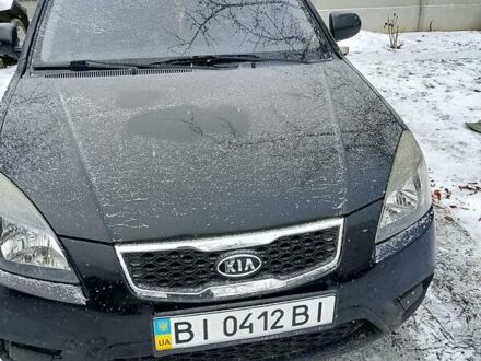 Чорний Кіа Ріо, об'ємом двигуна 1.4 л та пробігом 100 тис. км за 5800 $, фото 1 на Automoto.ua