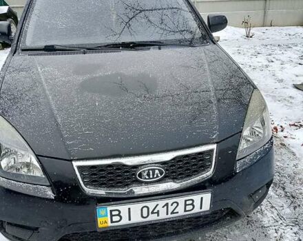 Черный Киа Рио, объемом двигателя 1.4 л и пробегом 100 тыс. км за 5800 $, фото 1 на Automoto.ua