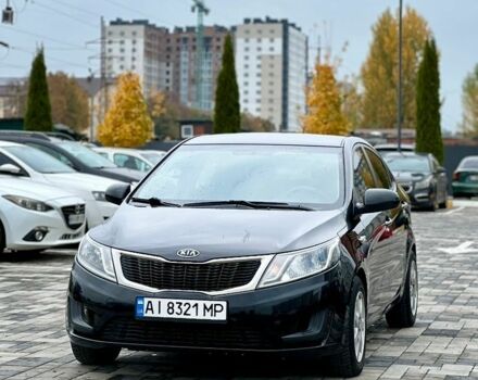 Чорний Кіа Ріо, об'ємом двигуна 1.4 л та пробігом 180 тис. км за 5900 $, фото 1 на Automoto.ua