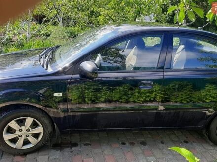 Черный Киа Рио, объемом двигателя 1.4 л и пробегом 140 тыс. км за 5200 $, фото 1 на Automoto.ua
