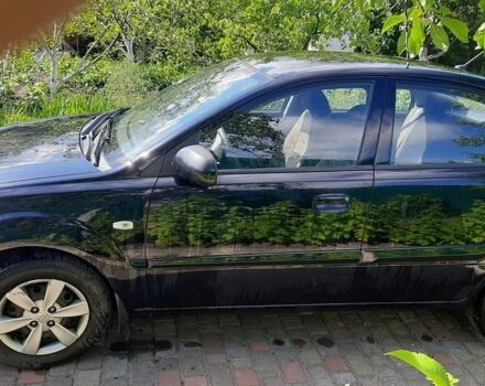 Черный Киа Рио, объемом двигателя 1.4 л и пробегом 140 тыс. км за 5200 $, фото 1 на Automoto.ua