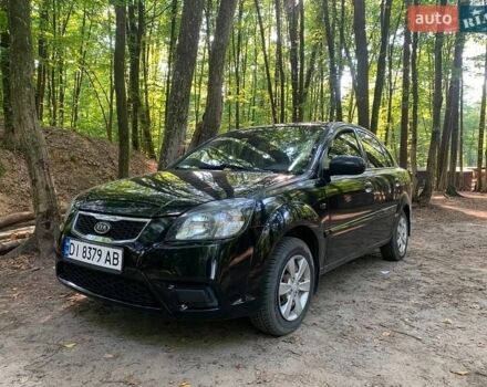 Чорний Кіа Ріо, об'ємом двигуна 1.4 л та пробігом 275 тис. км за 4700 $, фото 1 на Automoto.ua
