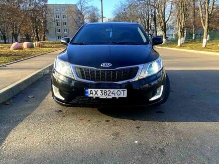 Чорний Кіа Ріо, об'ємом двигуна 1.4 л та пробігом 1350 тис. км за 7100 $, фото 1 на Automoto.ua