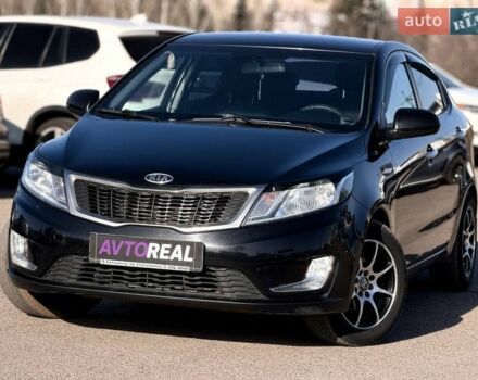 Черный Киа Рио, объемом двигателя 1.4 л и пробегом 162 тыс. км за 7700 $, фото 1 на Automoto.ua